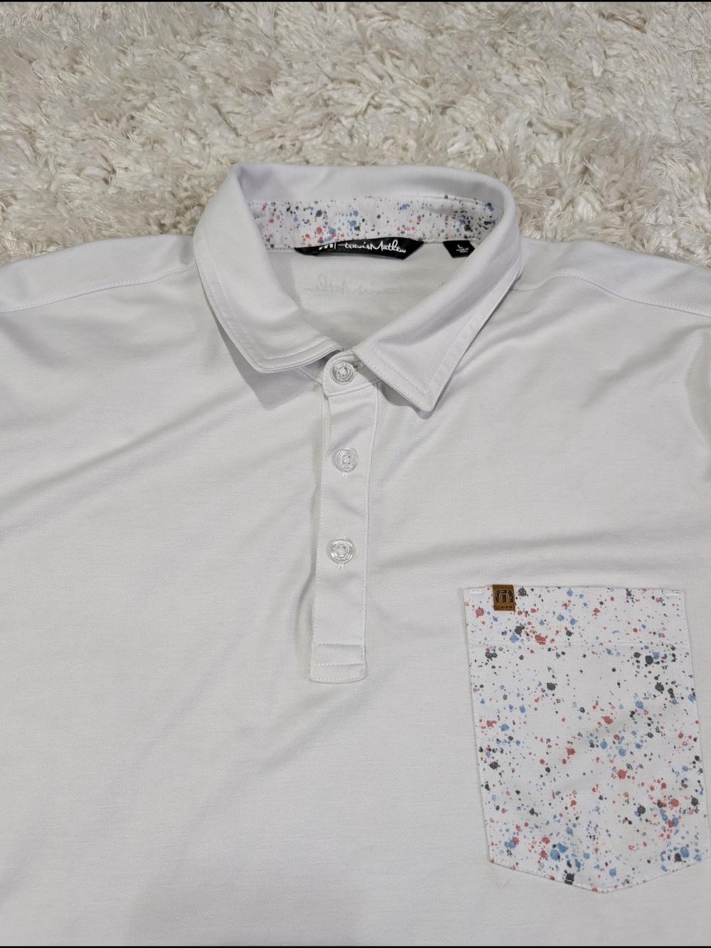 Travis Mathew White Polo with Multicolor Speckled Pocket